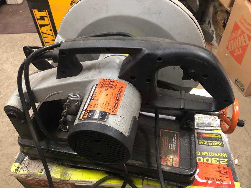 lot 106 image: Evolution Power Tools 14 in. Multi-Purpose Chop Saw in working conditions