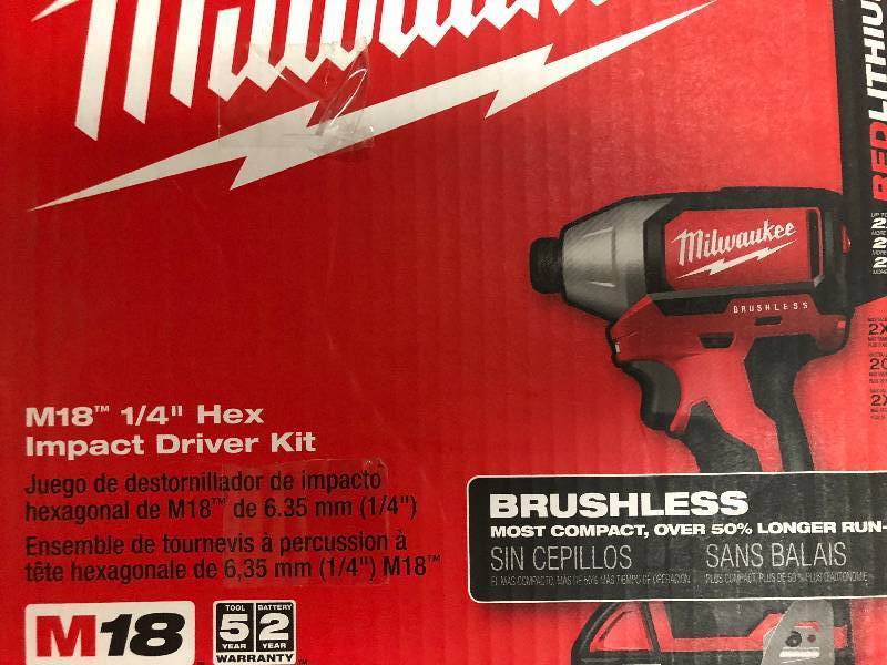 lot 105 image: M18 18-Volt Lithium-Ion Brushless Cordless 14 in. Compact Impact Driver Kit not used