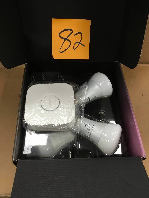 lot 82 image: Philips Hue Hue White and Color Ambiance A19 LED 60W Equiv. Dimmable Smart Wireless Lighting Starter Kit (4 Bulbs, and Bridge)