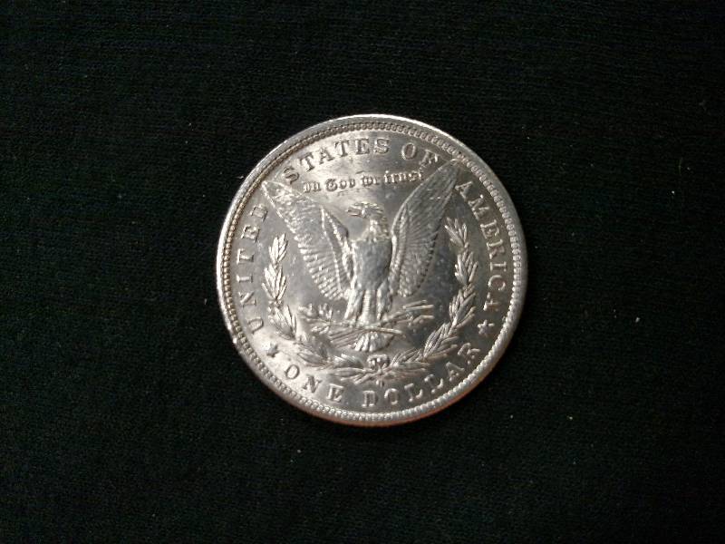 1884 O AU Morgan Silver Dollar...