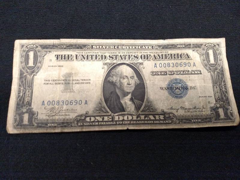 1935 B  Side Date One Dollar Silver...