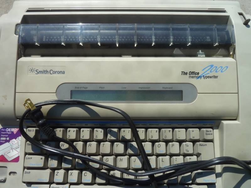 lot 73 image: Smith Corona Type Writer and Stand