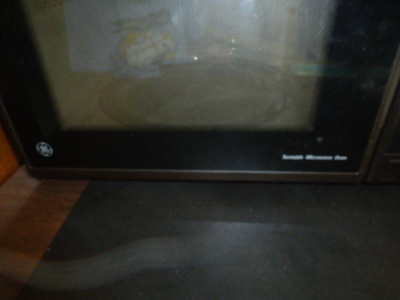 lot 10 image: Amana Microwave