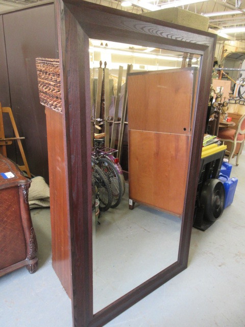 lot 721 image: LARGE BEVELED GLASS FRAMED MIRROR
