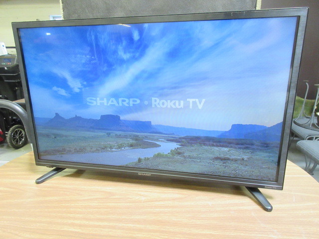 lot 733 image: 32 SHARP ROKU TELEVISION