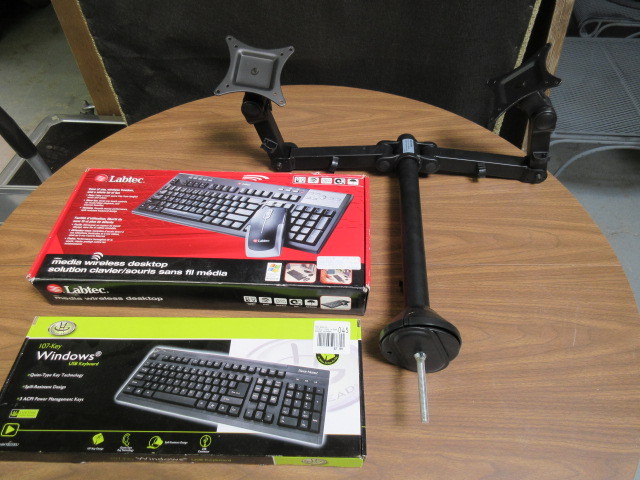 lot 737 image: DUAL SCREEN DESK MOUNT AND KEYBOARDS