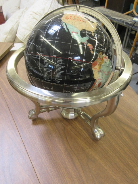 lot 732 image: STONE INLAY COMPASS GLOBE