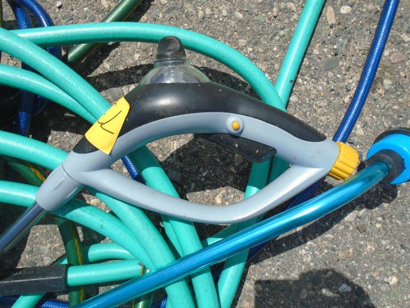 lot 73 image: Garden Hoses