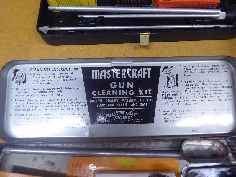 lot 66 image: Gun Cleaning Kits with Ammo Box