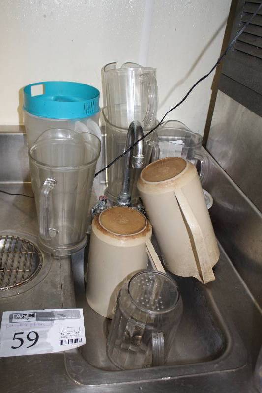 lot 59 image: Lot of (8) Plastic Pitchers
