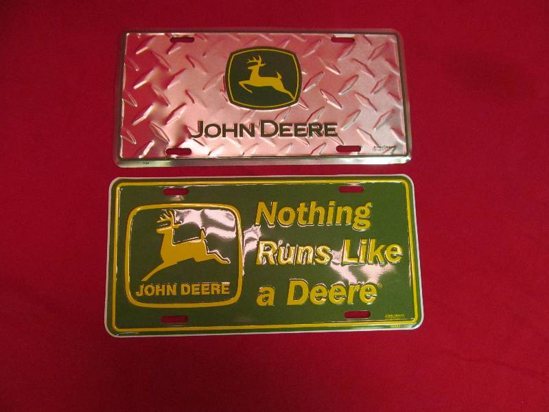 lot 16 image: 2 John Deere License Plates