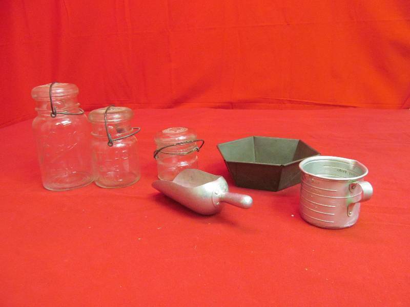 lot 42 image: 3 Vintage Jars with wire Bale Locks, aluminum scoop, aluminum mega cup, vintage Swansdown Cake Flour pan