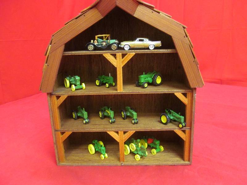 lot 72 image: Group of 164 Die Cast J.D. Tractors, 2 Cars in Hip Roof, Barn Style Shadow Box with Clear Door 12x13x4