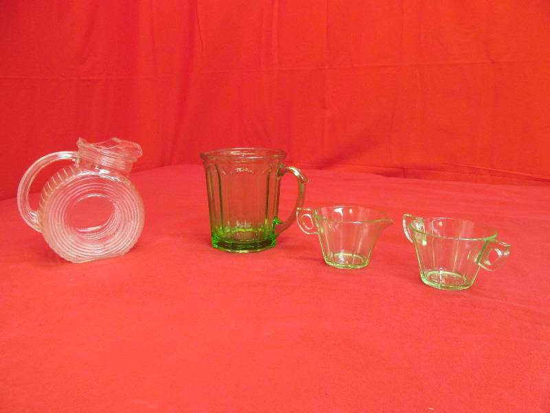 lot 97 image: Anchor Hocking Vaseline Glass Pitcher, 2 CreamSugar sets, Vintage Juice Pitcher