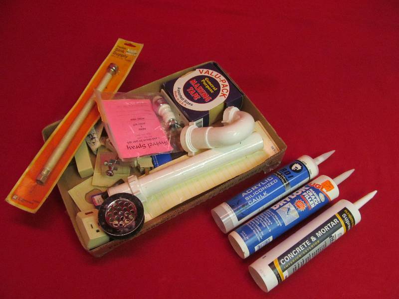 lot 142 image: Lot of Plumbing Supplies, Fittings, Connectors, Caulk and more