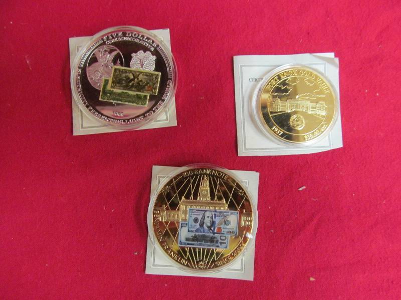 lot 161 image: 1 50mm Silver Certificate Commeriative Coin, 1 50mm Ben Franklin Eagle Commeriative coin, 1 40mm Fort Knox Gold Vault Commeriative coin, American Mint