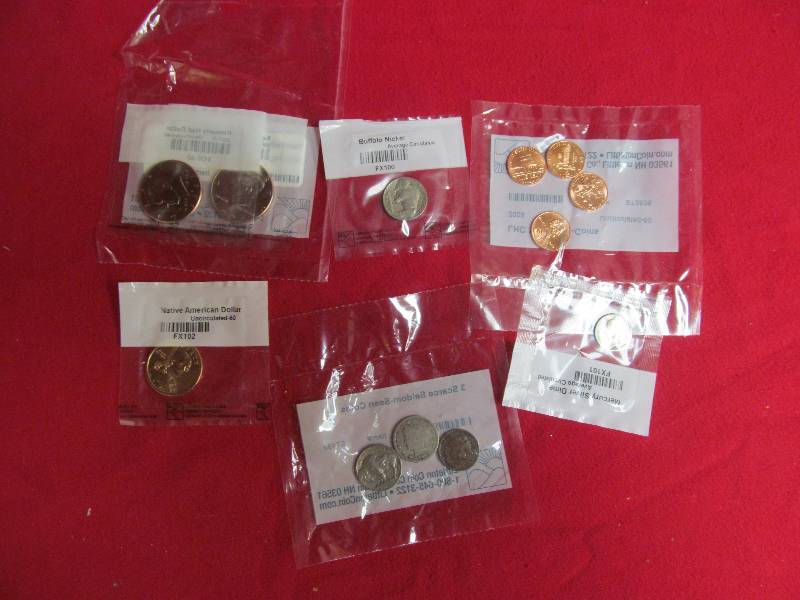 lot 163 image: LHC Year 2009 4 Coin Set Uncirculated, Native American Dollar Uncirculated, 2 Kennedy 2002 Half Dollar Uncirculated, 1943 Mercury Dime, 1935 Buffalo Nickel, 3 Scarlet Coins, 1906 V Nickel, 1937 Buffalo Nickel, 1907 Indian Head Penny