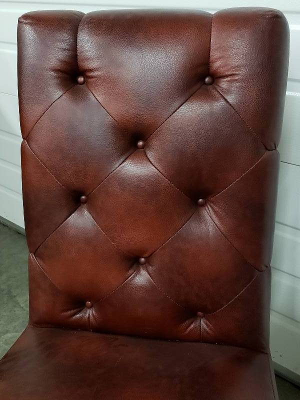 lot 35 image: Leather Styled Side Chair in the Chesterfield Design