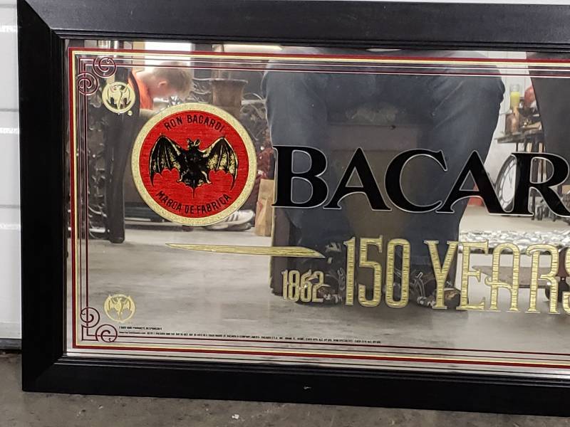 lot 107 image: Bacardi 150 Years Mirrored Wall Art