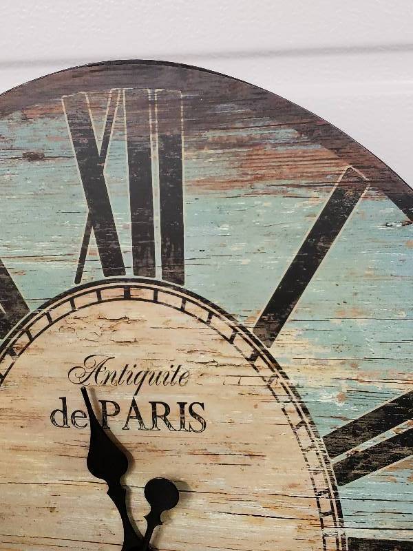 lot 132 image: Accentric Oval Rustic Styled Wall Clock