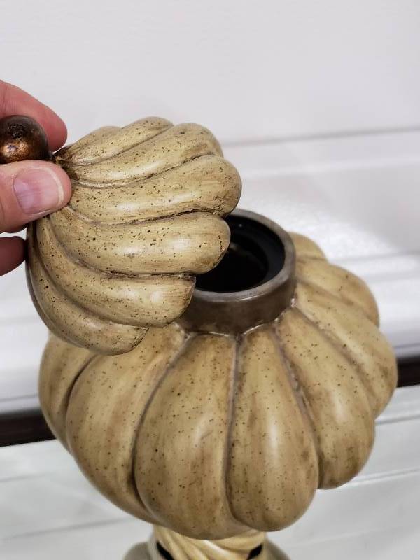 lot 148 image: Hefty Earth Toned Twisted Pottery Vase, Lidded