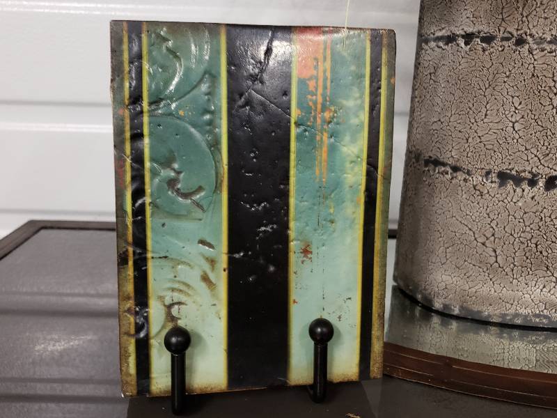 lot 161 image: Covered Metal Container, Artistic Tile on Stand, Rustic Container with Arrangements