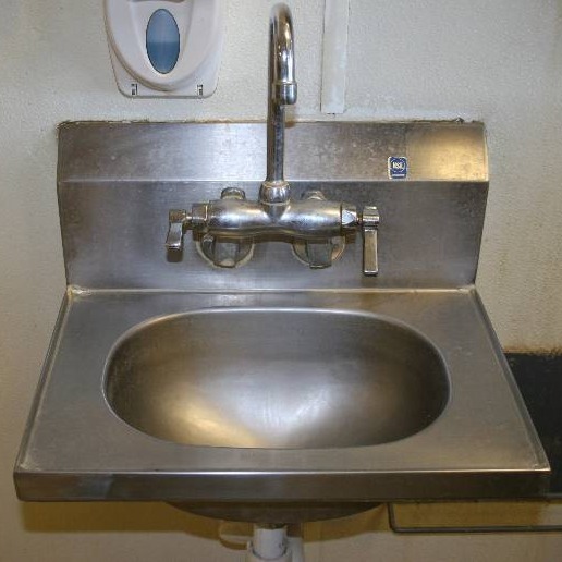 lot 36 image: Stainless Steel Sink with Faucet