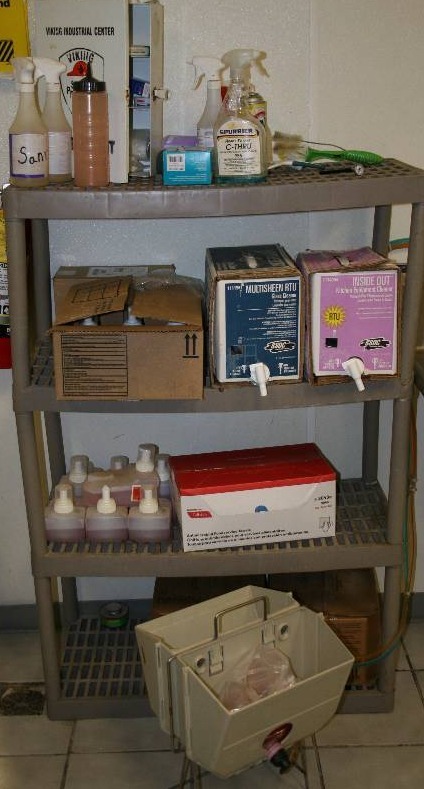 lot 37 image: Soap Dispenser System and Shelf with Cleaning Supplies