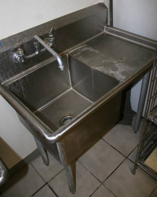 lot 40 image: Stainless Steel Sink with Faucet