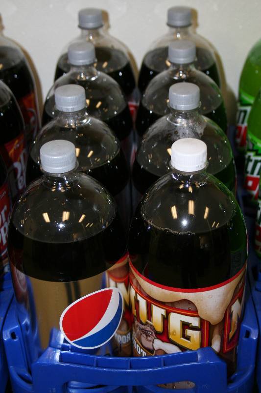 lot 111 image: Two Liter Bottles of Soda