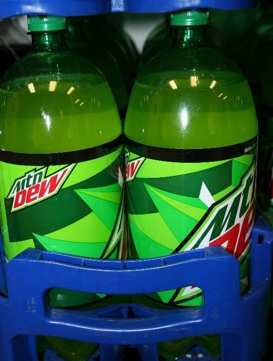 lot 112 image: Two Liter Bottles of Soda