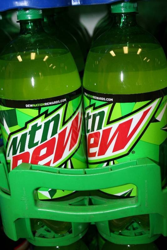 lot 115 image: Two Liter Bottles of Soda