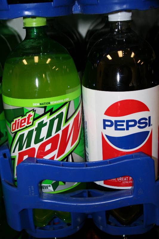 lot 118 image: Two Liter Bottles of Soda