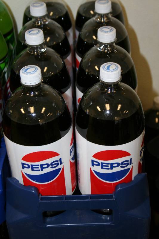 lot 120 image: Two Liter Bottles of Soda