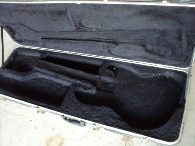 lot 13 image: Hard case guitar case...