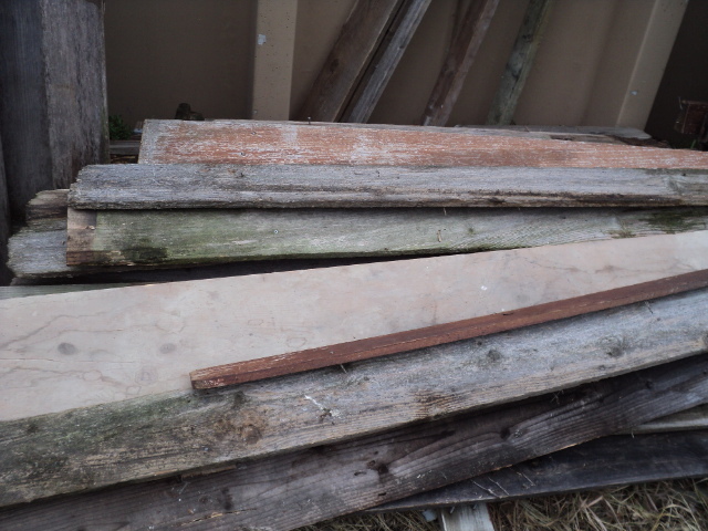 lot 34 image: pile of reclaimed fence pickets and...