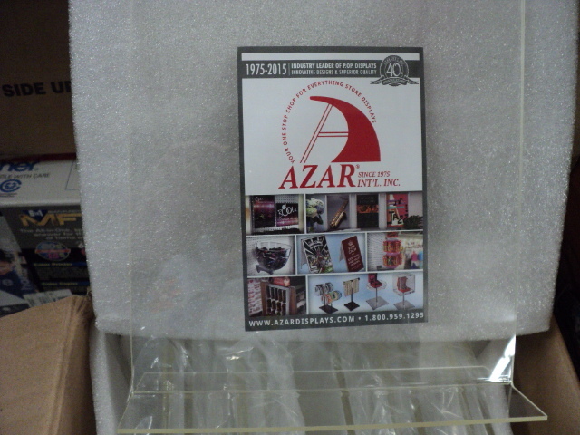 lot 174 image: Azar display stands...