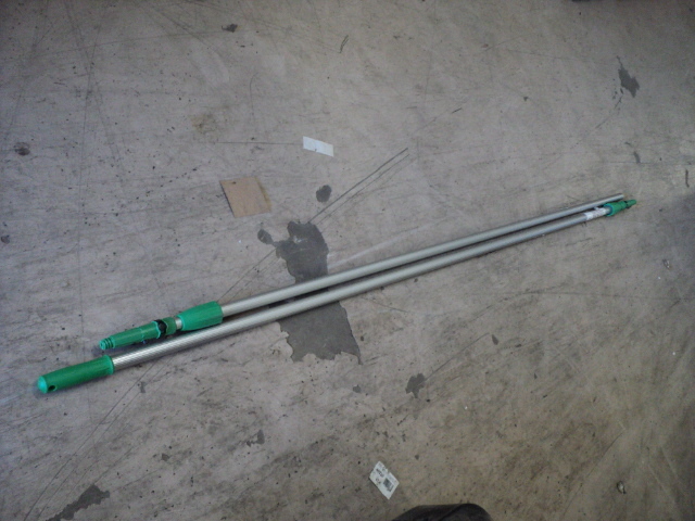 lot 200 image: 2 extension poles - 1 needs handle...