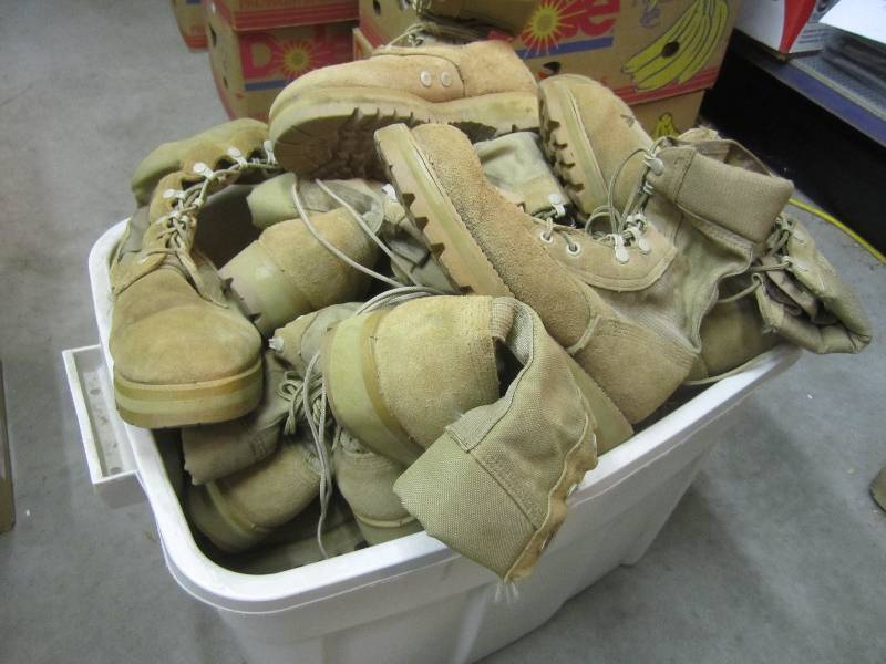 lot 31 image: Tote Full of 14 Pair of Vibram Mili...