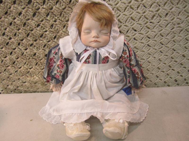 lot 50 image: Locally Hand Made Doll 12 high sit...