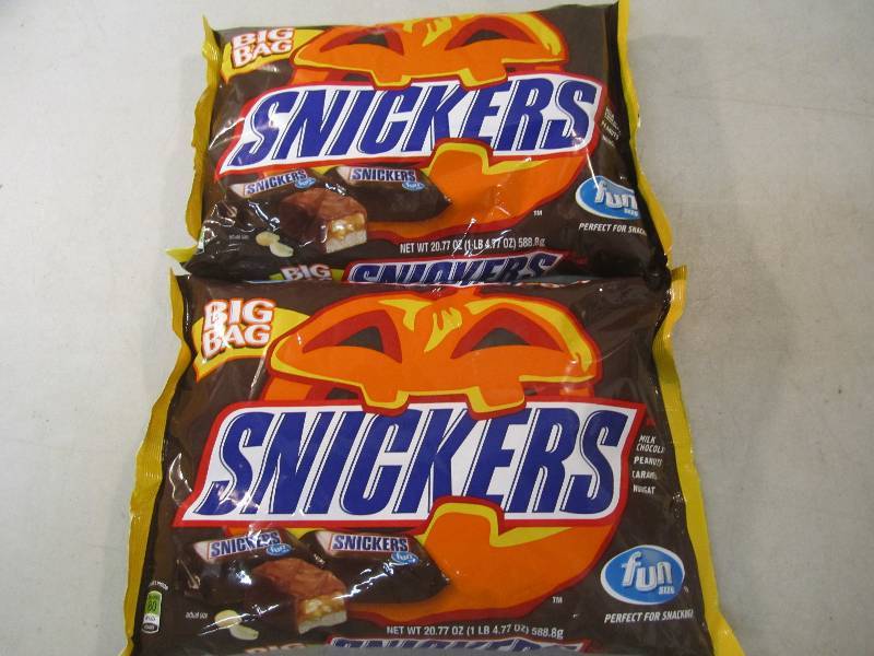 lot 210 image: 2 Big Bags of Fun Size Snickers Can...