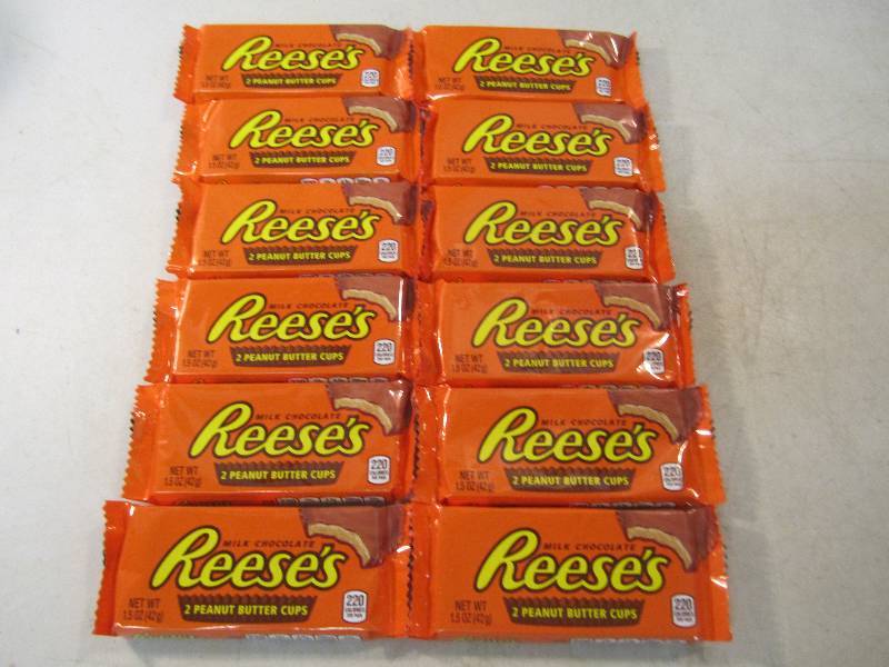 lot 213 image: 12 Reeses Peanut Butter Cup 2 packs...