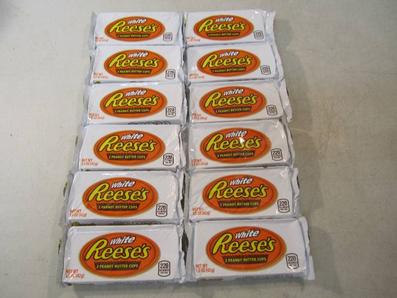 lot 215 image: 12 White Reeses Peanut Butter Cup 2...
