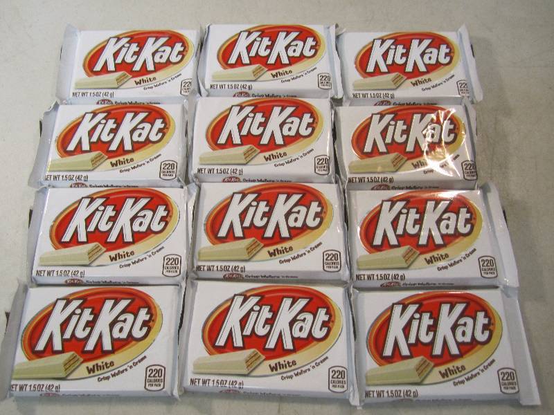 lot 217 image: 12 White Kit Kat Crisp Wafers Candy...