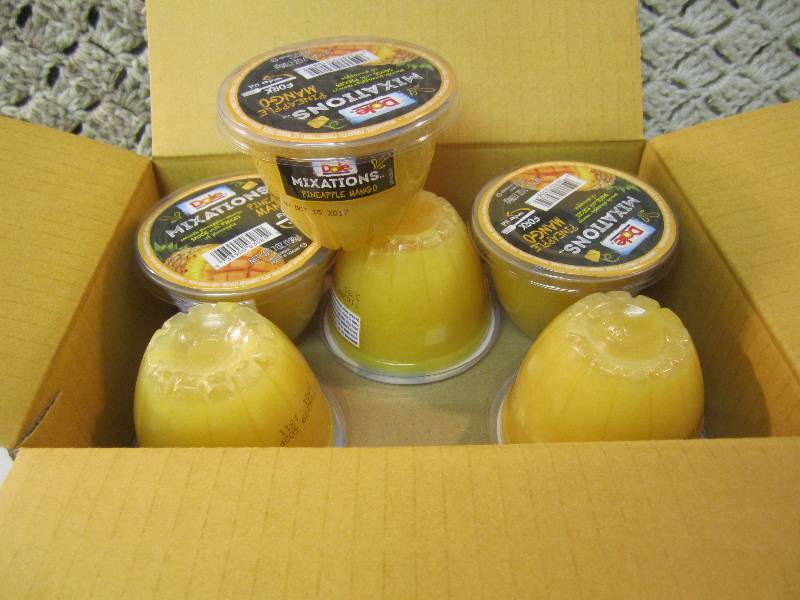 lot 273 image: Case of 12 Dole Mixations Pineapple...