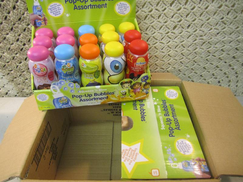 lot 296 image: Case of 30 Squeeze N Blow Pop-Up B...