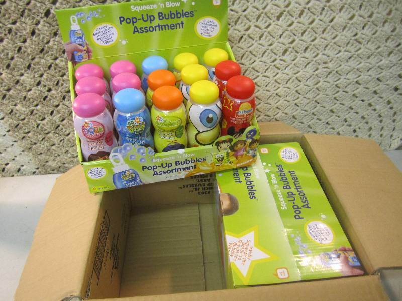 lot 297 image: Case of 30 Squeeze N Blow Pop-Up B...