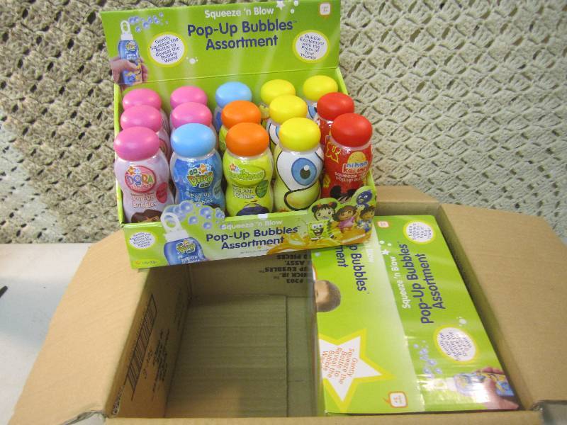 lot 298 image: Case of 30 Squeeze N Blow Pop-Up B...