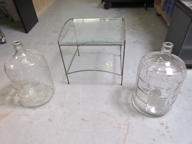 lot 943 image: GLASS JUGS AND END TABLE