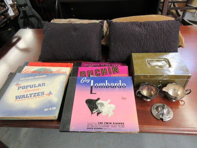 lot 952 image: PILLOWS, SILVER, AND RECORDS
